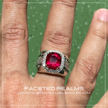 5.3 Carat Vivid Reddish Pink Rubellite Tourmaline Ring from Afghanistan, Cushion Cut, Flanked by 32 Round Brilliant Moissanites and 20 Round Faceted Lime Green Tourmalines, Set in Rhodium Polished 925 Silver. High-Quality Fine Jewelry by Faceted Realms, Showcasing Rare and Mesmerizing Gemstone with Dramatic Color Change from Reddish Pink to Pigeon Blood Red.